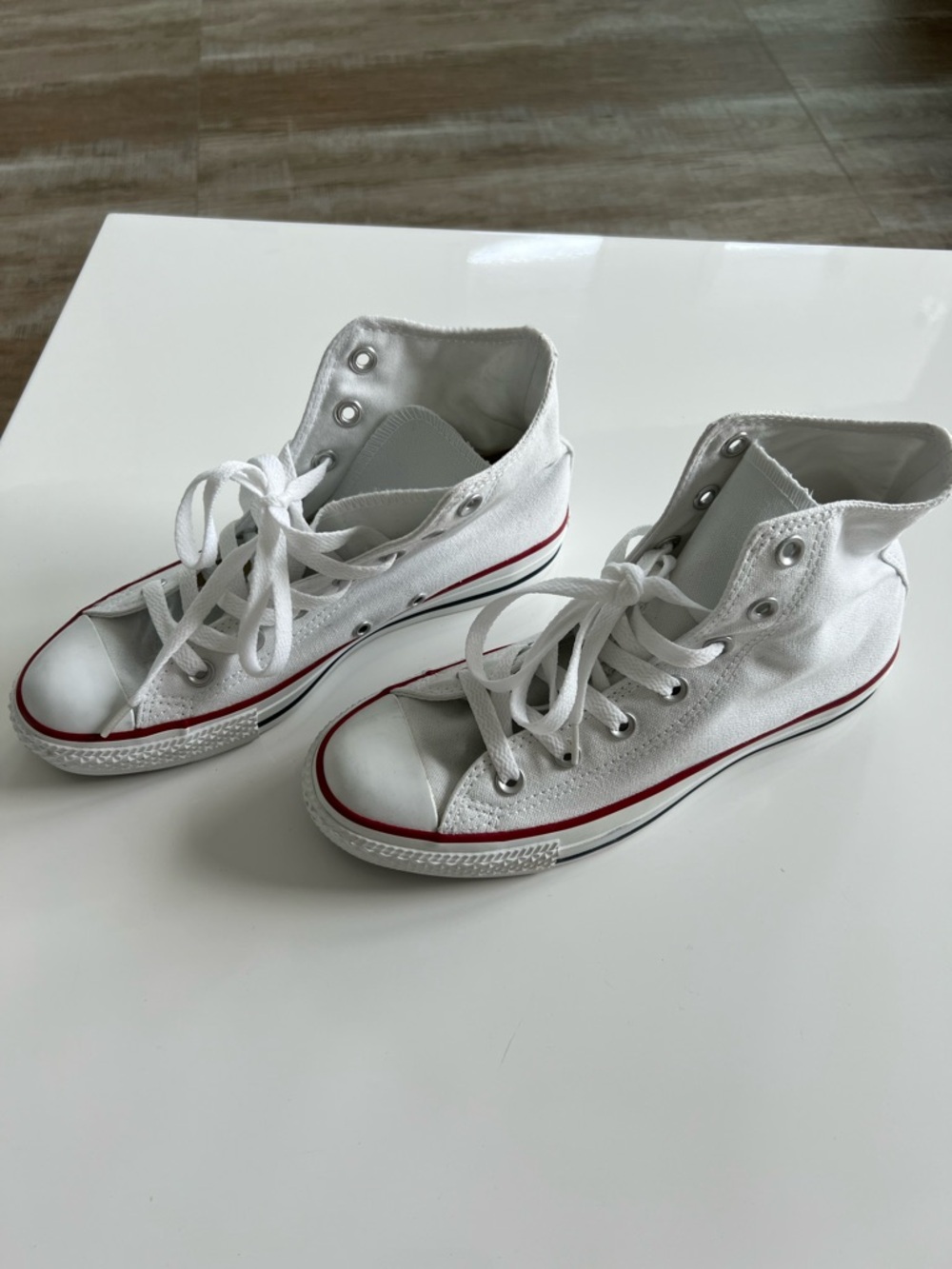 Converse White High-Top Sneakers with Red Stripe